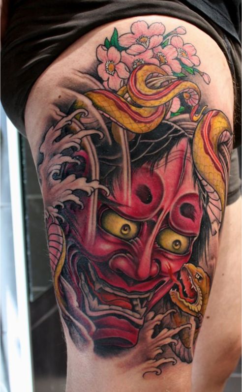 Phong cách xăm hình mặt quỷ ở đùi