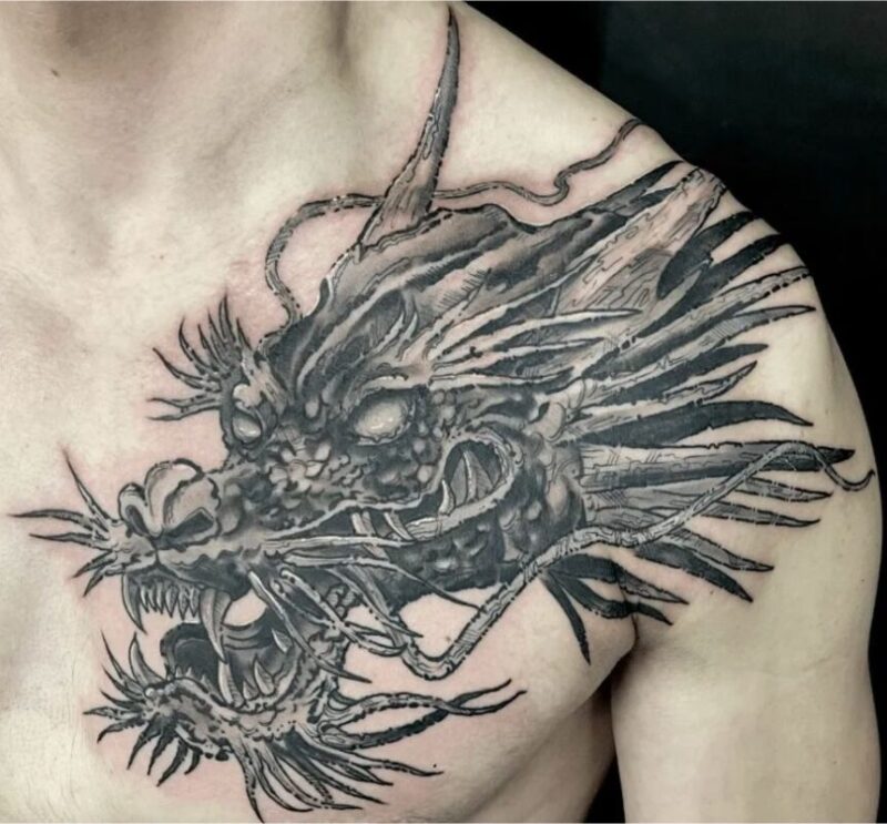 Hình xăm đầu rồng trên vai
